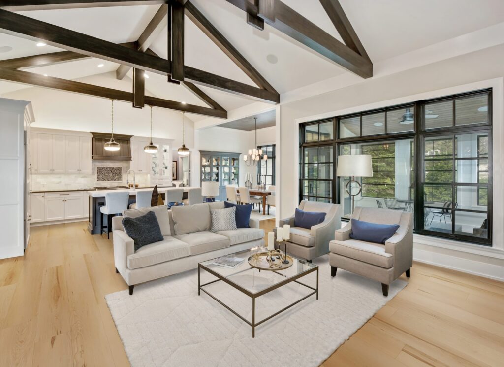 Open great room and kitchen with CALI Longboards luxury vinyl plank flooring in Morro Beige