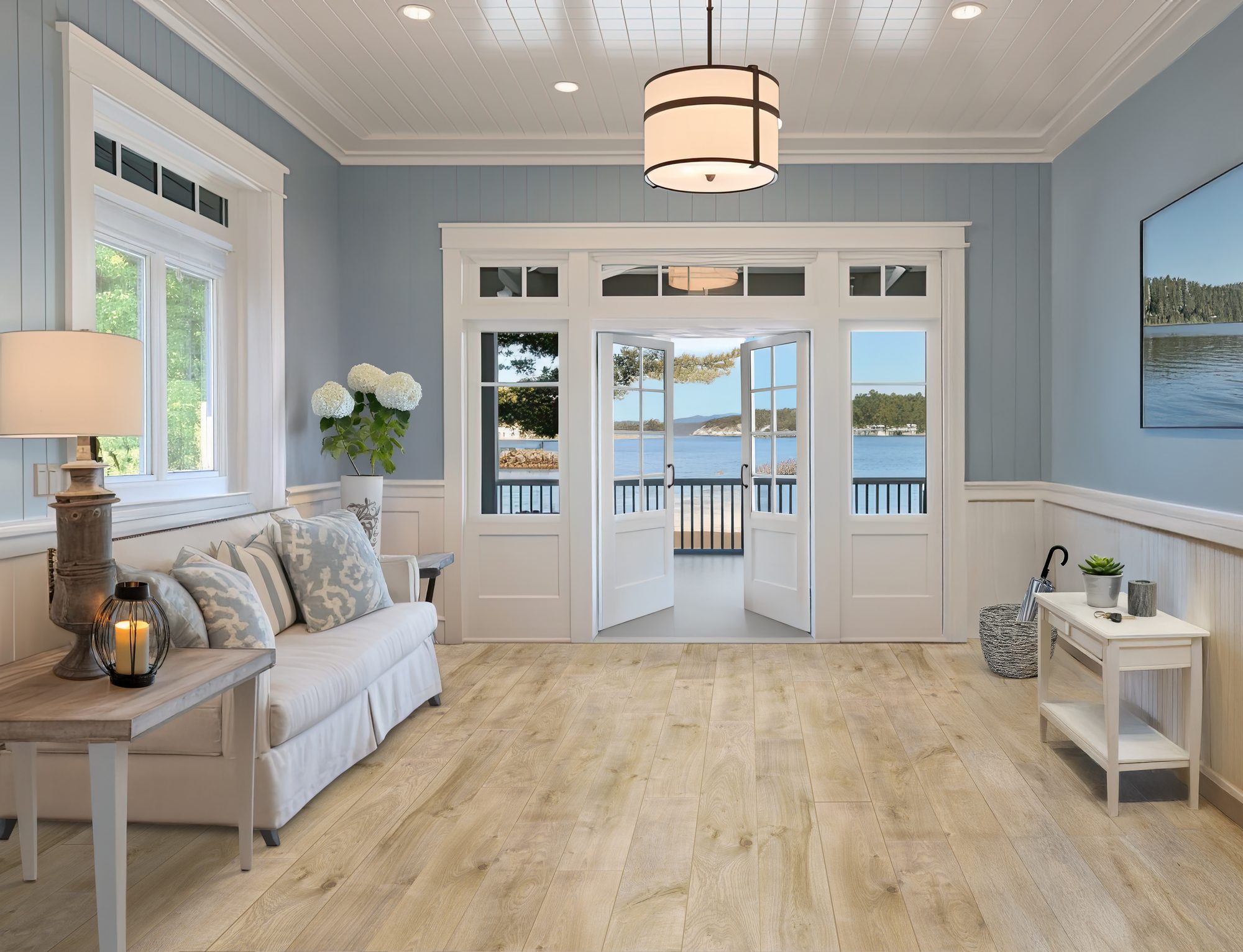 Quick-Step Studio laminate living room - Kirkpatrick Floors Living room with a lake view and Quick-Step Studio laminate flooring in Natural Oak